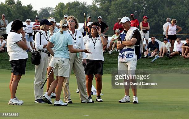 European team member Annika Sorenstam of Sweden has an animated discussion with LPGA rules official Barb Trammell after the match referee Kendra...