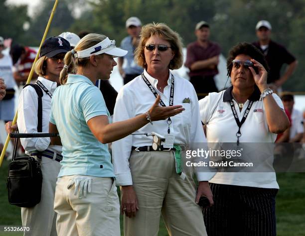 European team member Annika Sorenstam of Sweden has an animated discussion with LPGA rules official Barb Trammell after the match referee Kendra...