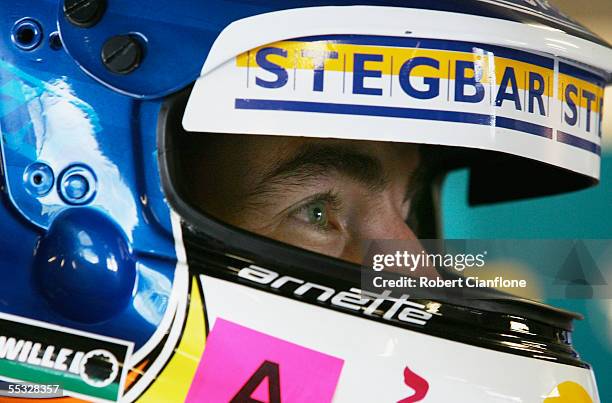 Marcos Ambrose of the Stone Brothers Racing Team looks on during qualifying for the Betta Electrical 500, which is round nine of the V8 Supercars...