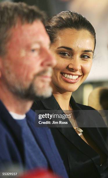 Actor Lisa Ray listens to producer David Hamilton at the press conference for the film 'Water' on September 9, 2005 in Toronto, Canada.