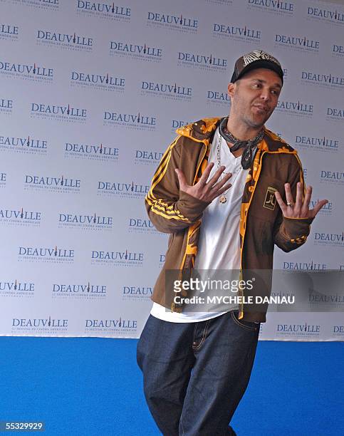 Photographer and director David LaChapelle gestures during a photocall of his movie, "Rize", presented at the 31st Deauville American Film Festival,...