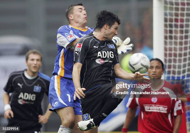 Raphael Wicky of Hamburg heads his 1:0 goal past Mainz goalkeeper Dimo Wache during the Bundesliga match between 1. FSV Mainz and Hamburger SV at the...