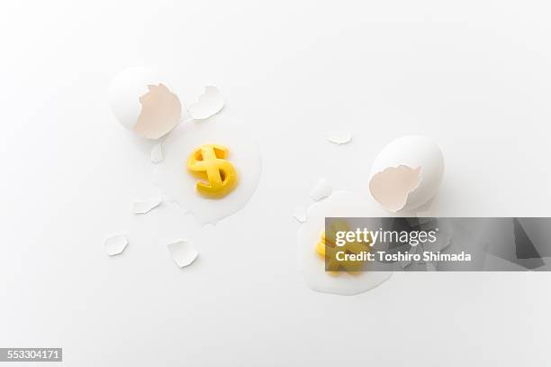 egg yolk shape like currency - yen symbol stock-fotos und bilder