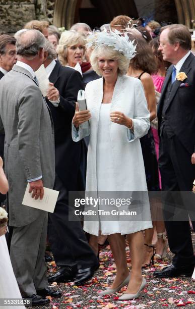 Prince Charles and Camilla Duchess of Cornwall at the wedding of Tom Parker-Bowles to Sara Buys. The Duchess and The Prince of Wales mingle with...