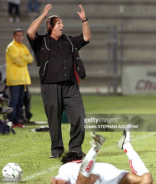 Ajaccio's coach Rolland Courbis reacts during the French L1 football match against Nancy, 10 september 2005, at the Francois Coty's stadium in...