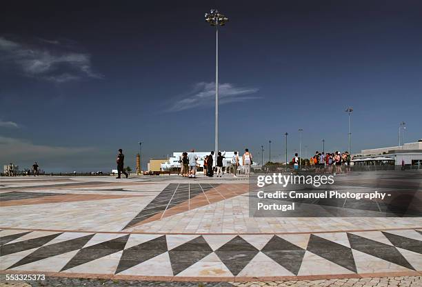 wind roses and tourists in belem, lisbon - belem_(ship) stock pictures, royalty-free photos & images