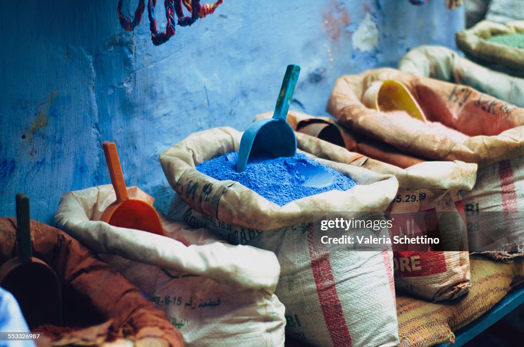 Colored powders for textile dyes on streets