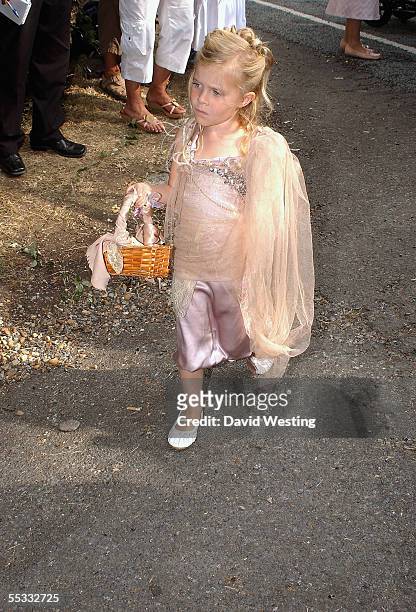 Young guest arrives for the wedding of model Jodie Kidd and internet tychoon Aidan Butler at St. Peter's Church, on September 10, 2005 in Twineham,...