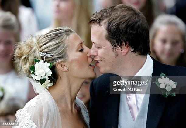Tom Parker Bowles and his new wife Sara leave their ceremony in St. Nicholas Church, Henley-on-Thames on September 10, 2005 in Oxfordshire, England.