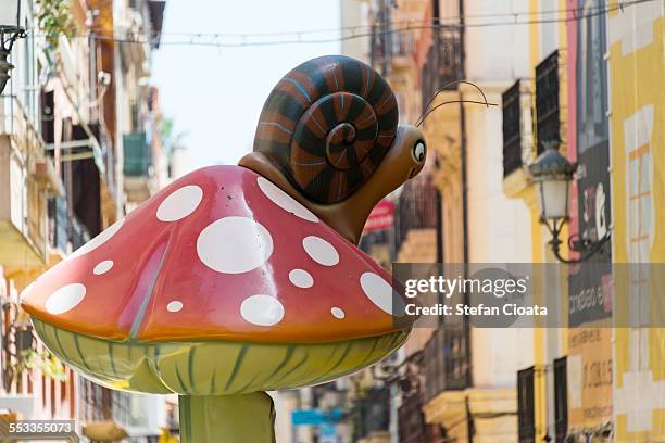 mushroom and snail in alicante - alicante street stock pictures, royalty-free photos & images