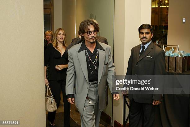 Johnny Depp arrives for the TIFF after party for 'Tim Burton's Corpse Bride' on September 10, 2005 in Toronto, Canada.