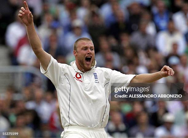 London, UNITED KINGDOM: Englands Andrew Flintoff appeals for the wicket of Australias Michael Clarke on the fourth day of the fifth and final NPower...