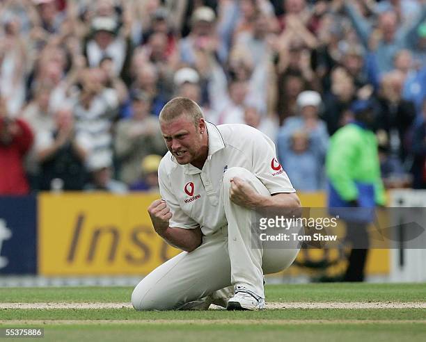 Andrew Flintoff of England celebrates the wicket of Shane Warne of Australia during day four of the Fifth npower Ashes Test match between England and...