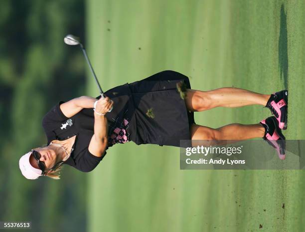 European Team member Annika Sorenstam of Sweden hits a shot on the 2nd hole during her singles match against Beth Daniel of the USA in the final...