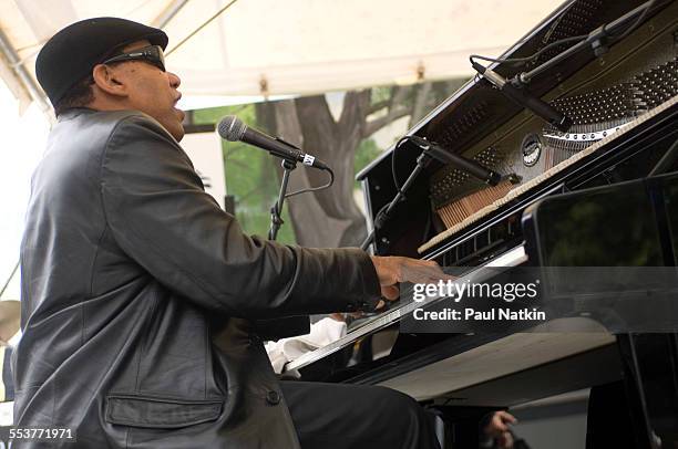 American Blues musician Henry Butler plays piano as he performs onstage at the Petrillo Bandshell in Grant Park, Chicago, Illinois, June 9, 2006.