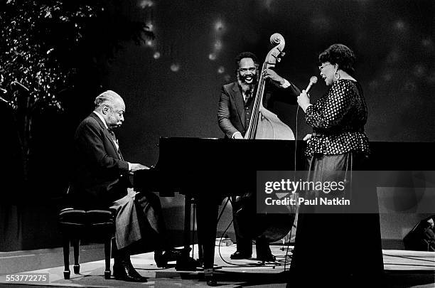 American Jazz musicians Count Basie , on piano, and singer Ella Fitzgerald perform during an episode of the PBS television series 'Soundstage,'...
