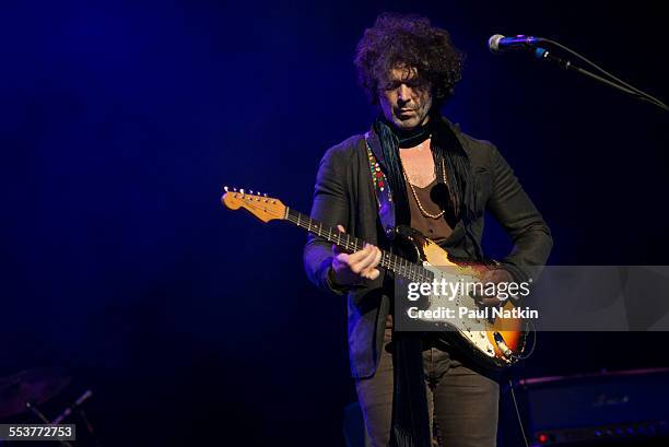 American Blues musician Doyle Bramhall performs onstage at the Chicago Theater, Chicago, Illinois, March 14, 2014.