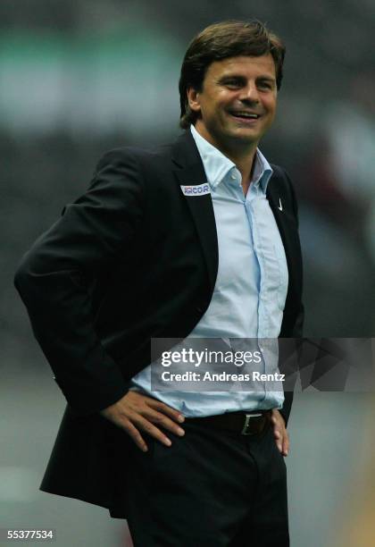 Berlin's coach Falko Goetz smiles during the Bundesliga match between Hertha BSC Berlin and VfL Wolfsburg at the Olympiastadion on September 11, 2005...