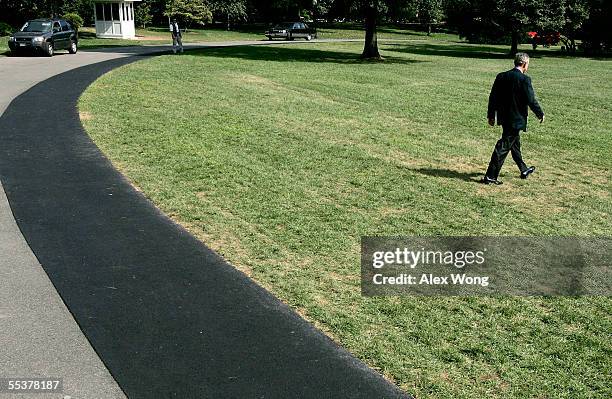 President George W. Bush walks toward Marine One prior to his departure from the White House September 11, 2005 in Washington, DC. Bush is going to...