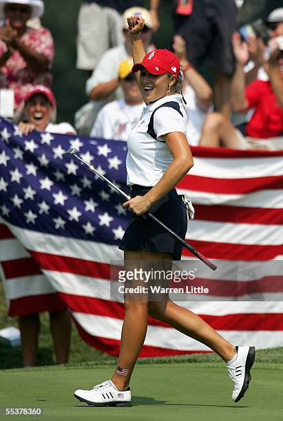 Natalie Gulbis of the USA celebrates winning her Singles match 2&1 against European Maria Hjorth during the 2005 Solheim Cup at Crooked Stick Golf...