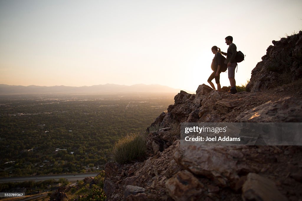 A young couple hike above Salt Lake City