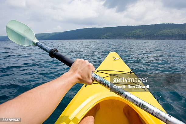 kayaking - human arm stock pictures, royalty-free photos & images