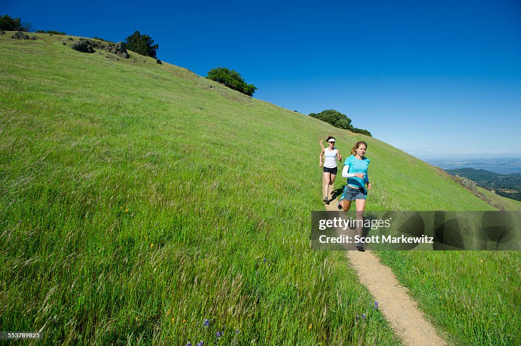 Two girls run in California