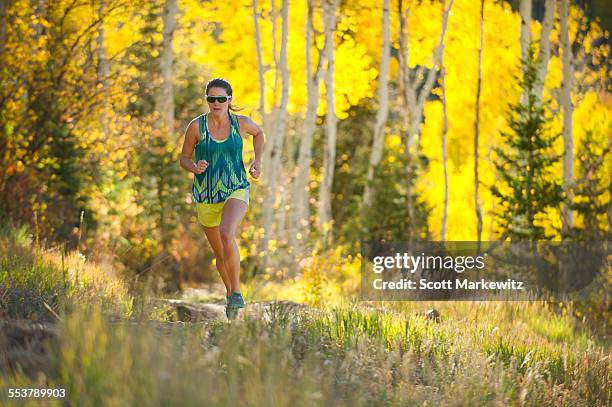 woman running in utah - alta utah stock pictures, royalty-free photos & images