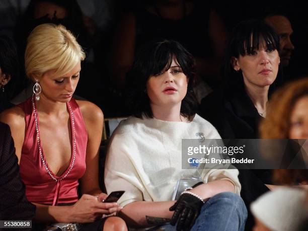 Socialite Paris Hilton and singer Kelly Osbourne attend the Kai Milla Spring 2006 fashion show during Olympus Fashion Week at the New York Public...