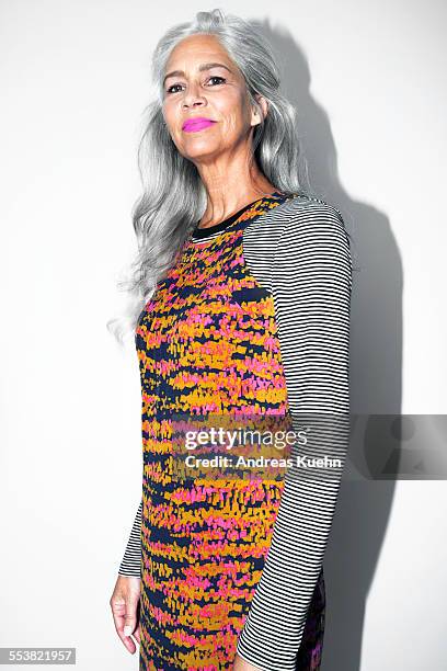 woman with grey hair and pink lipstick. - funky hair studio shot stock pictures, royalty-free photos & images