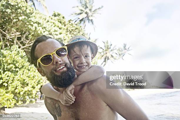 father and son on vacation in sri lanka - semi dress stock pictures, royalty-free photos & images