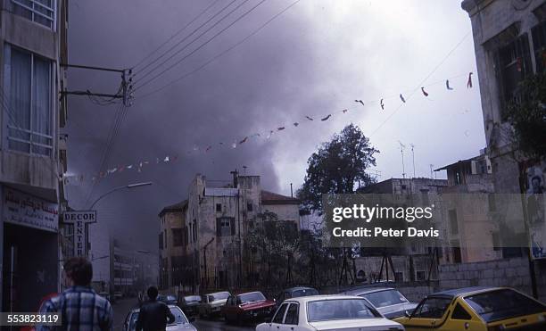 Dark smoke billows up at the site of the suicide bombing at the American Embassy, Beirut, Lebanon, April 18, 1983.