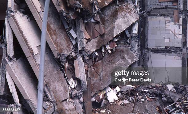 View of the collapsed facade and damage at the scene of the suicide bombing of the American Embassy, Beirut, Lebanon, April 18, 1983.