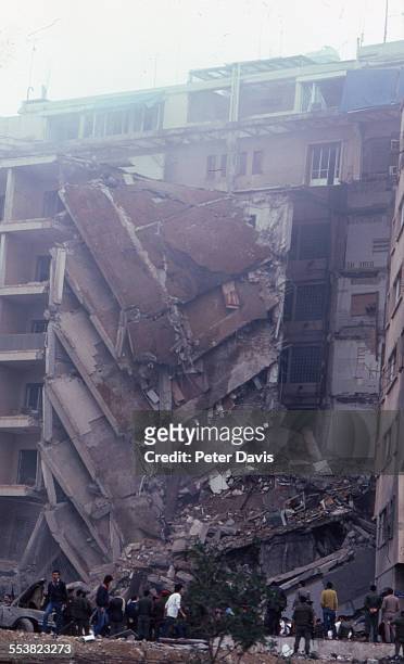 View of the collapsed facade and widespread damage at the scene of the suicide bombing of the American Embassy, Beirut, Lebanon, April 18, 1983.