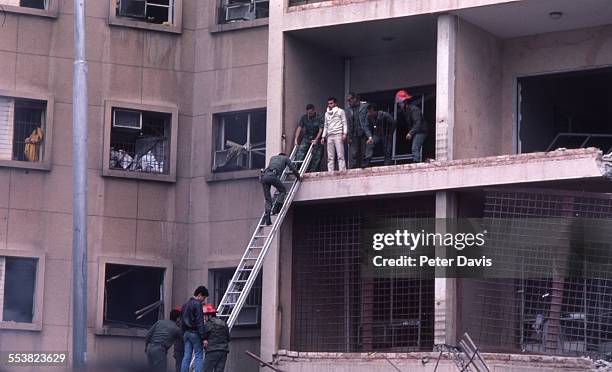 View of the destruction and damage at the scene of the suicide bombing of the American Embassy, Beirut, Lebanon, April 18, 1983.