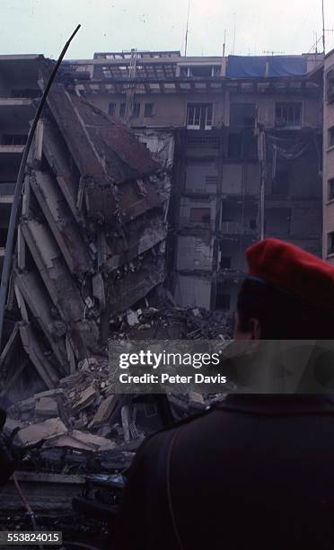 View of the collapsed facade and damage at the scene of the suicide bombing of the American Embassy, Beirut, Lebanon, April 18, 1983.