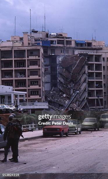 View of the collapsed facade and damage at the scene of the suicide bombing of the American Embassy, Beirut, Lebanon, April 18, 1983.