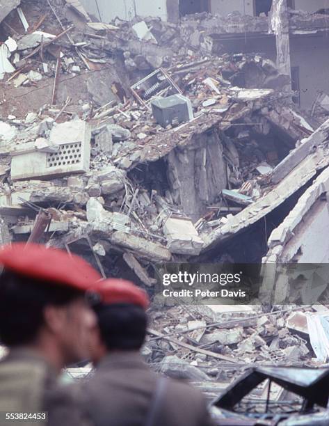 View of the collapsed facade and damage at the scene of the suicide bombing of the American Embassy, Beirut, Lebanon, April 18, 1983.