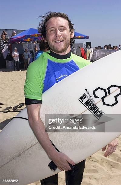 Incubus guitarist Mike Einziger participates in the Surfrider Celebrity Surf Jam at the Huntington Beach Pier on September 11, 2005 in Huntington...