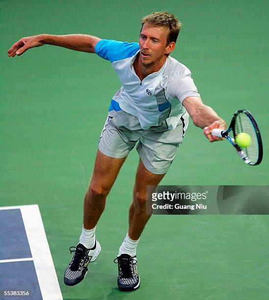 Wayne Arthurs of Australia returns a shoot during the men's single first round of China Open against Peter Wessels of Netherlands at Beijing Tennis...