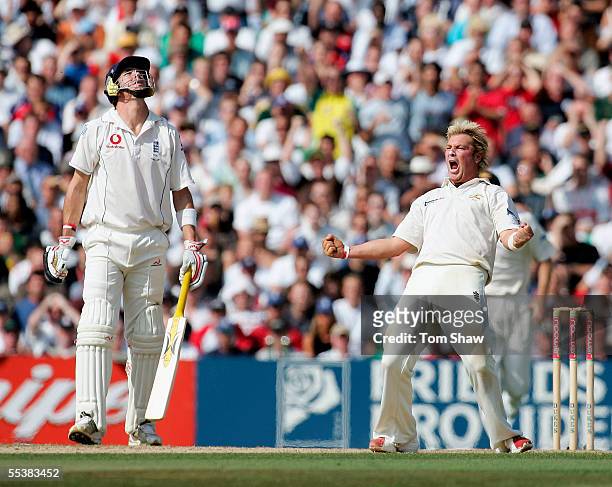 Shane Warne of Australia celebrates the wicket of Andrew Flintoff of England as Kevin Pietersen looks on during day five of the Fifth npower Ashes...