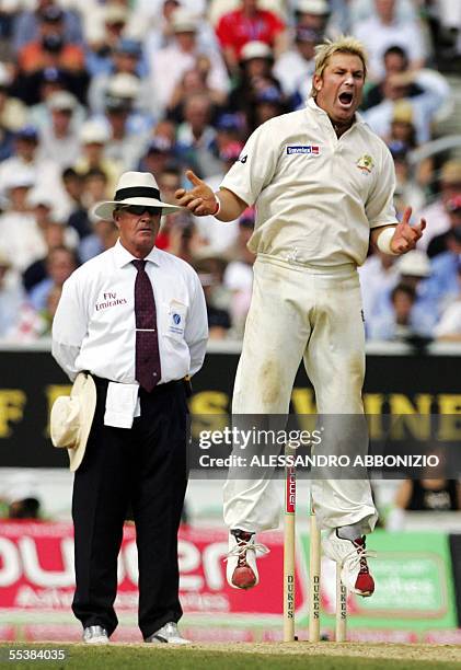 London, UNITED KINGDOM: Australian bowler Shane Warne appeals as he bowls to Englands Kevin Pietersen on the fifth day of the fifth and final NPower...