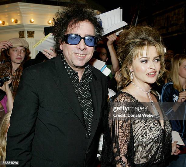 Director Tim Burton and actress Helena Bonham-Carter arrive on the red carpet during the arrivals for the TIFF premiere screening of 'Tim Burton's...