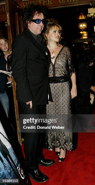 Director Tim Burton and actress Helena Bonham-Carter arrive on the red carpet during the arrivals for the TIFF premiere screening of 'Tim Burton's...