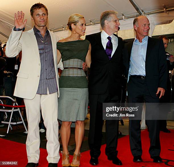 Actor Viggo Mortensen, actress Maria Bello, director David Cronenberg and actor Ed Harris arrive at the Premiere of 'History of Violence' on...