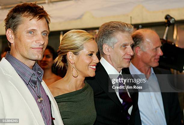 Actor Viggo Mortensen, actress Maria Bello, director David Cronenberg and actor Ed Harris arrive at the Premiere of 'History of Violence' on...