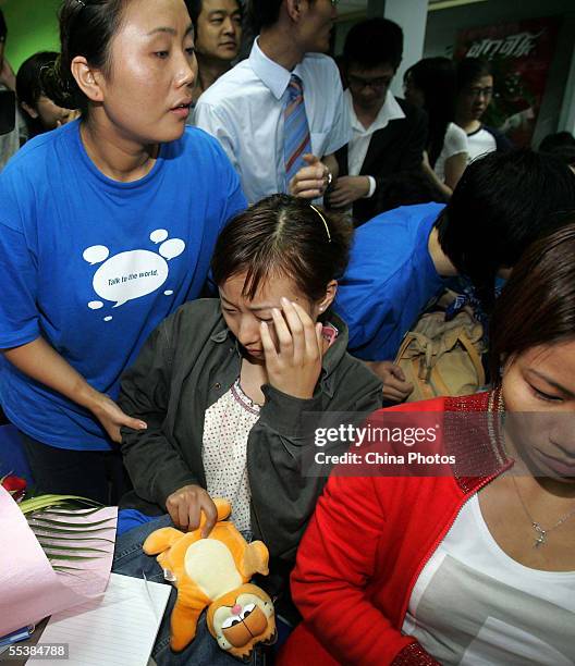 Student of the EF English First training center feels sick after participating in a 72-hour-long class to set a world record for the longest...