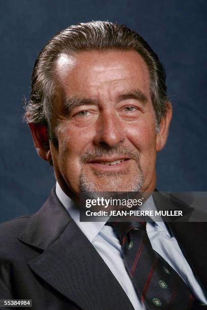 Portuguese eurodeputy and member of the Group of the European People's Party and European Democrats Joao de Deus Pinheiro poses on the sideline of a...