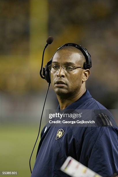 Offensive coordinator and running backs coach Michael Haywood of the Notre Dame Fighting Irish on the sideline during a game against the University...