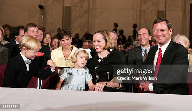 Jack Roberts , son of U.S. Supreme Court Chief Justice nominee John Roberts jokes with his father on the first day of confirmation hearings September...